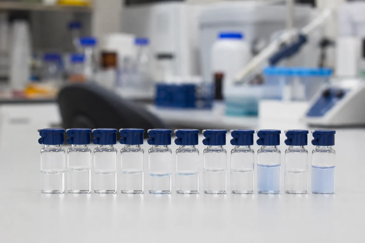 Research peptide vials on a laboratory bench — GetAll Peptides